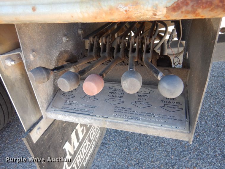 image for item KJ9163 2009 GMC C5500  rollback truck