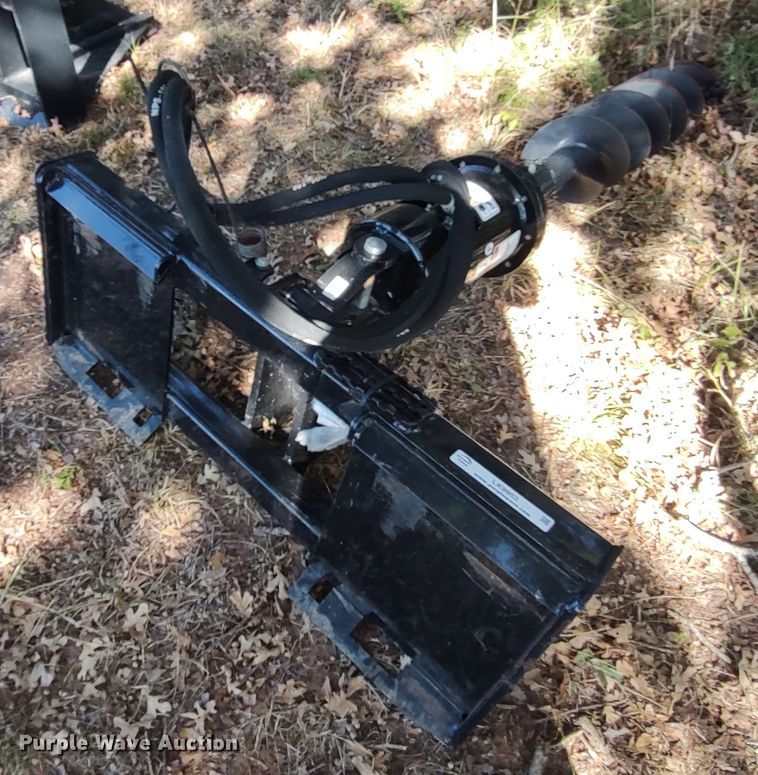 image for item LK9953 Kubota SA35  skid steer auger