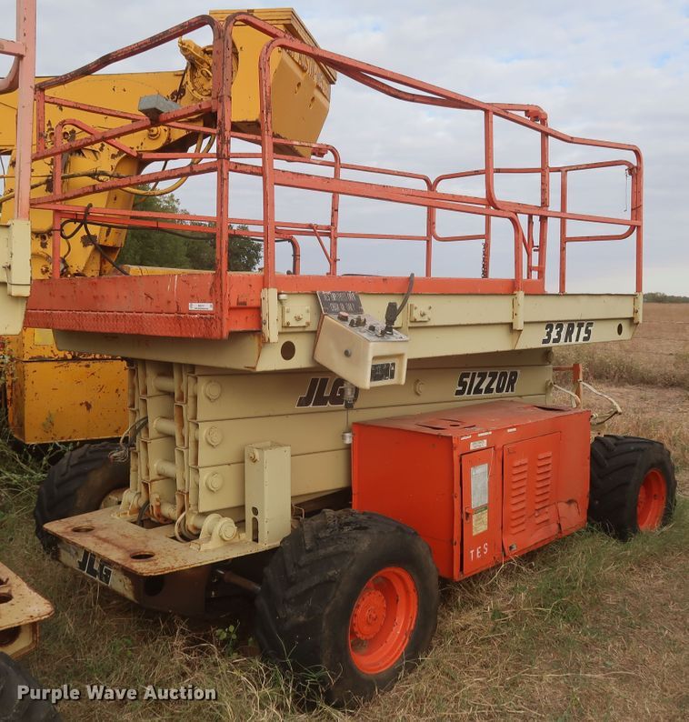 image for item MJ9187 1996 JLG 33-RTS  scissor lift