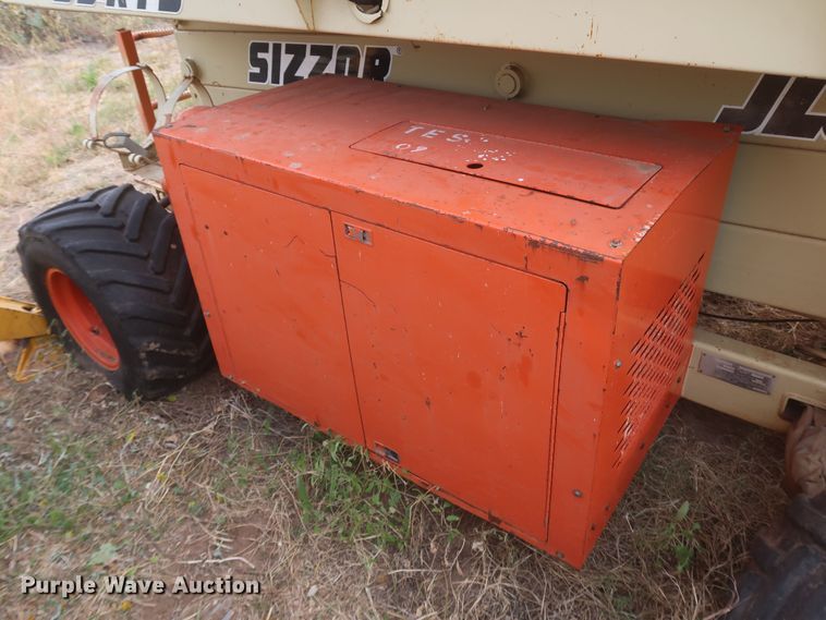 image for item MJ9187 1996 JLG 33-RTS  scissor lift