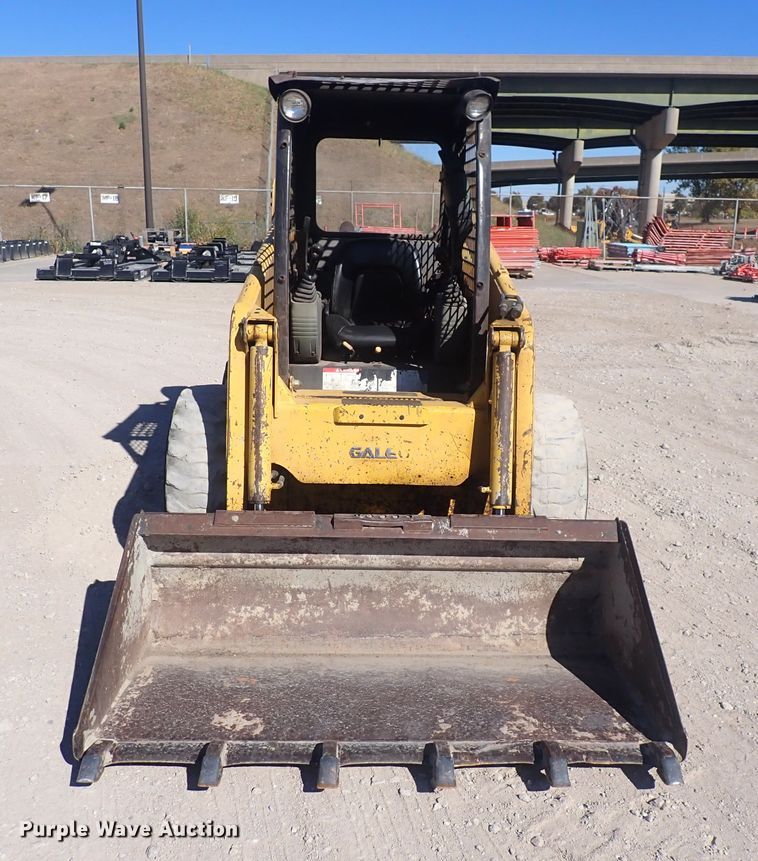 image for item DQ3047 2005 Komatsu 1020T  skid steer loader