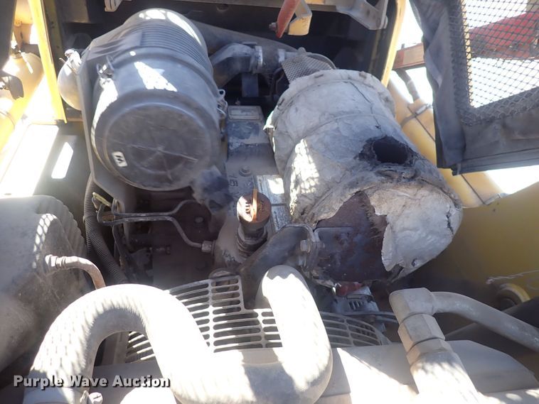 image for item DQ3047 2005 Komatsu 1020T  skid steer loader