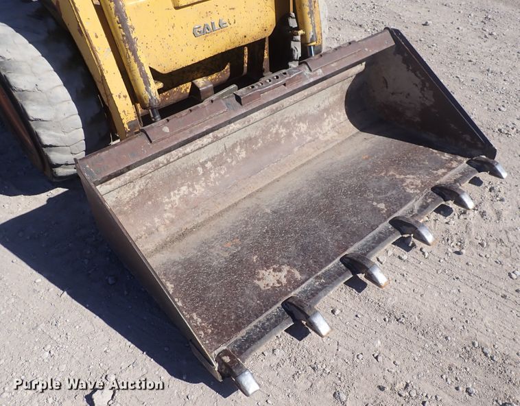 image for item DQ3047 2005 Komatsu 1020T  skid steer loader