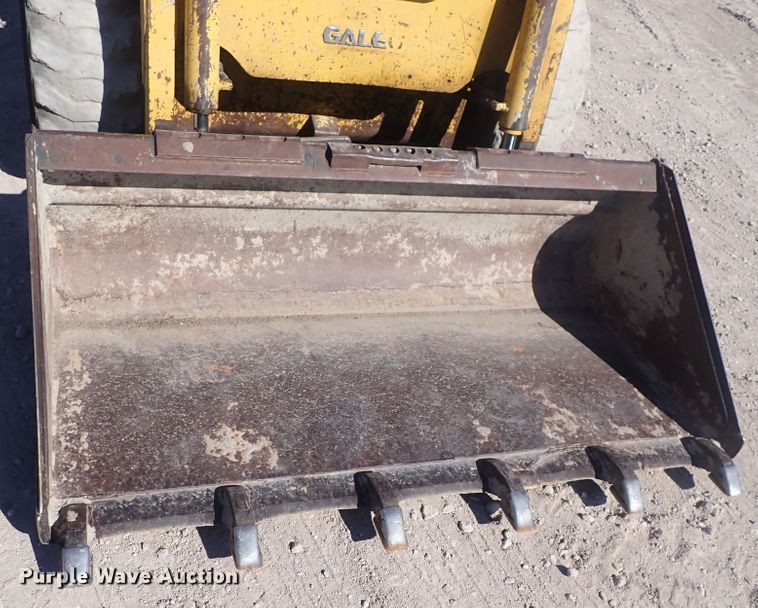 image for item DQ3047 2005 Komatsu 1020T  skid steer loader