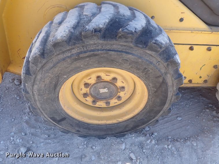 image for item DQ3047 2005 Komatsu 1020T  skid steer loader