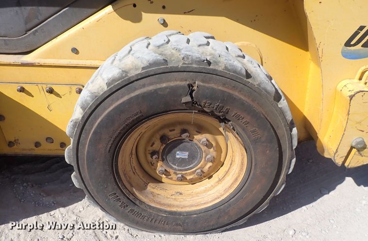 image for item DQ3047 2005 Komatsu 1020T  skid steer loader