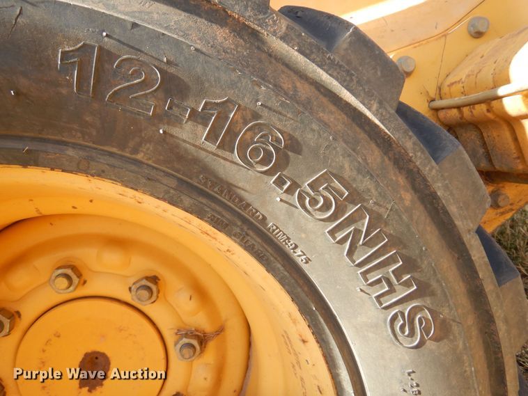 image for item JJ9662 2004 John Deere 260 Series II  skid steer loader