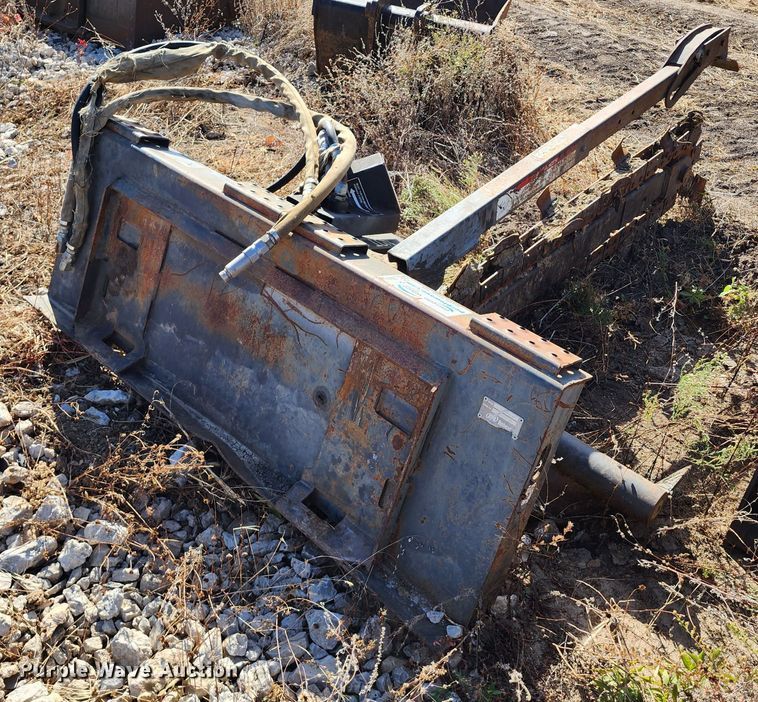 image for item KH9163 Bobcat LT303  skid steer trencher