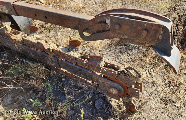 image for item KH9163 Bobcat LT303  skid steer trencher