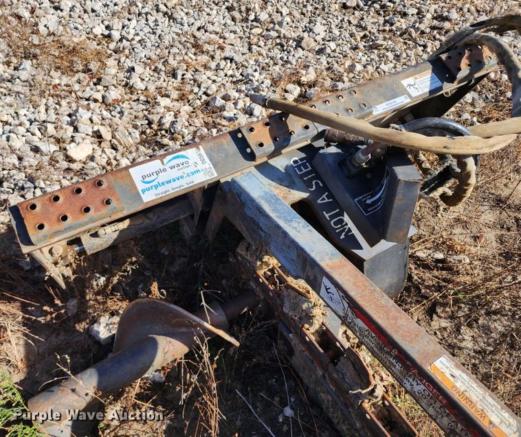 image for item KH9163 Bobcat LT303  skid steer trencher