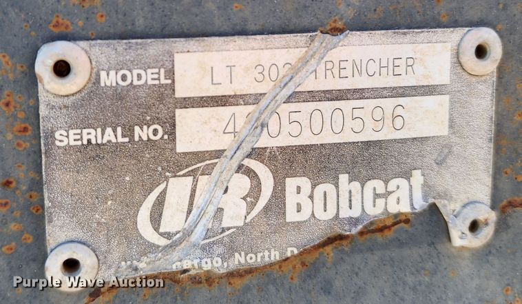 image for item KH9163 Bobcat LT303  skid steer trencher