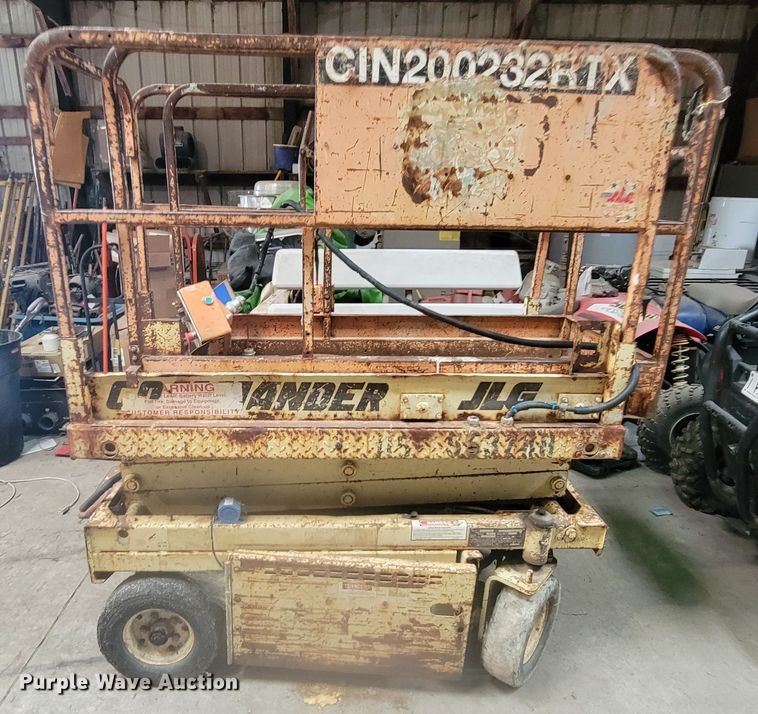 image for item LL9659 1993 JLG CM-1432  scissor lift