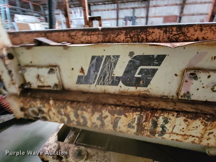 image for item LL9659 1993 JLG CM-1432  scissor lift