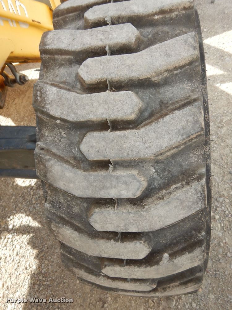 image for item DI6834 2001 New Holland LB110  backhoe