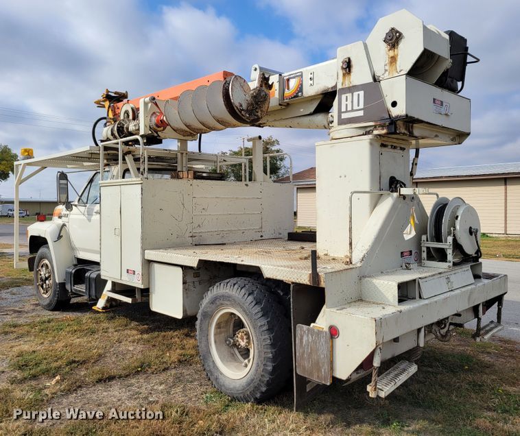 image for item DM8074 1985 Ford F800  digger derrick truck