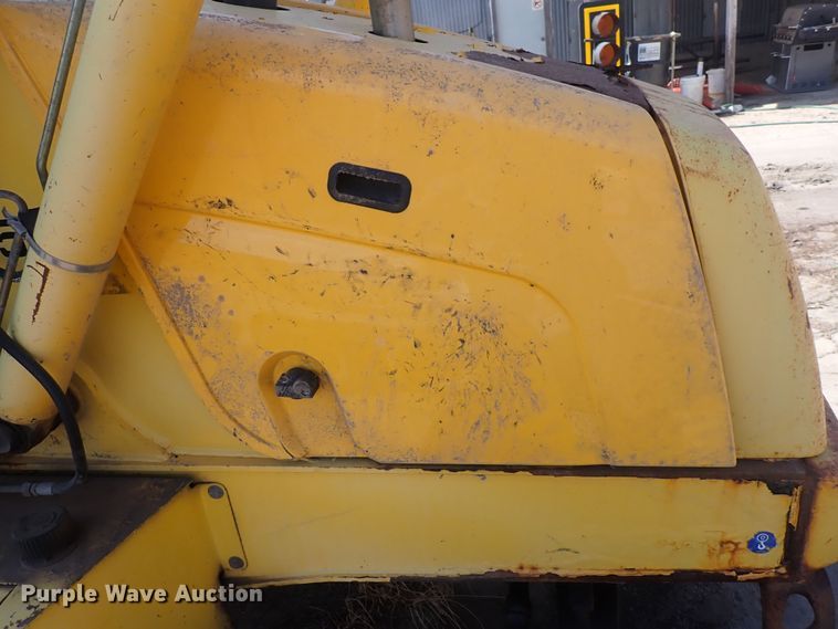 image for item DQ3006 New Holland 555E  backhoe