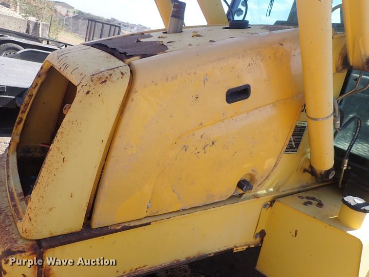 image for item DQ3006 New Holland 555E  backhoe