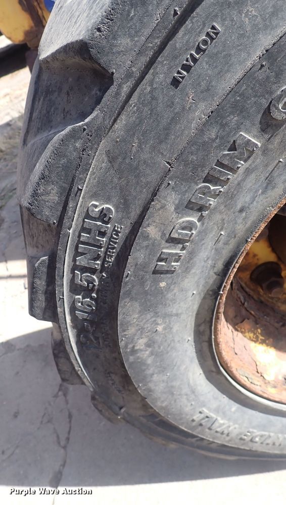 image for item DQ3006 New Holland 555E  backhoe