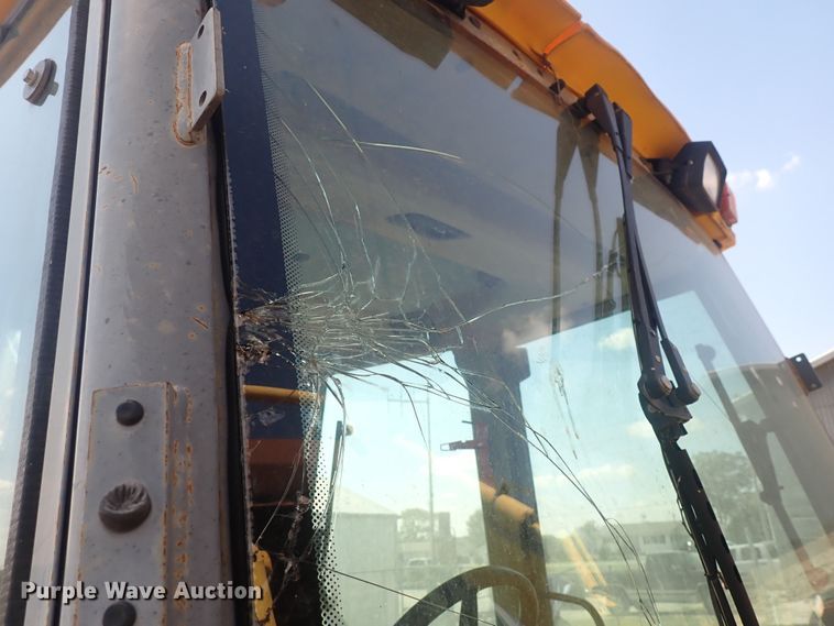 image for item DQ3006 New Holland 555E  backhoe