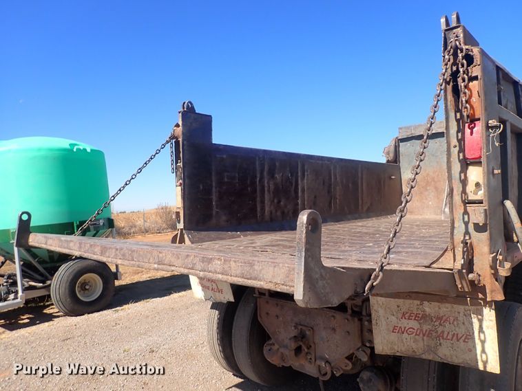 image for item DQ3055 1999 Freightliner FL80  dump truck