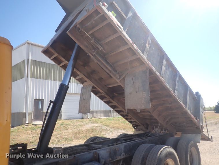 image for item DQ3055 1999 Freightliner FL80  dump truck