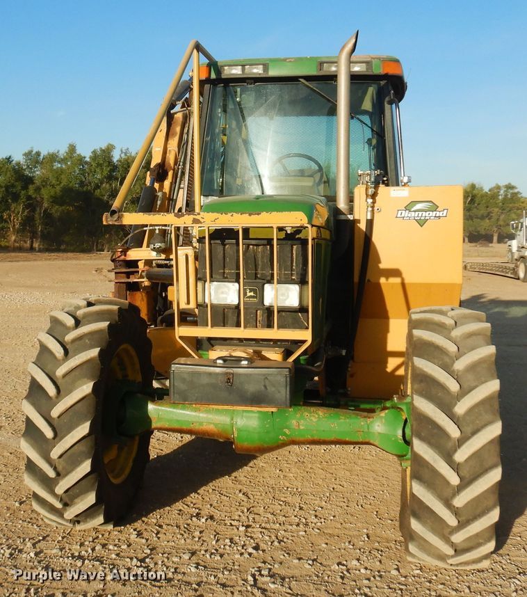 image for item KJ9159 2000 John Deere 7210  MFWD tractor