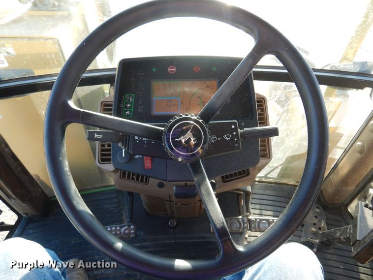 image for item KJ9159 2000 John Deere 7210  MFWD tractor