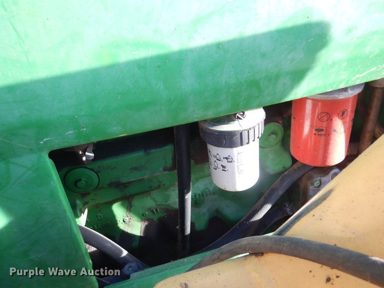 image for item KJ9159 2000 John Deere 7210  MFWD tractor