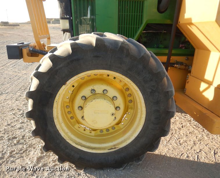 image for item KJ9159 2000 John Deere 7210  MFWD tractor