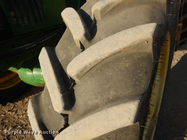 image for item KJ9159 2000 John Deere 7210  MFWD tractor