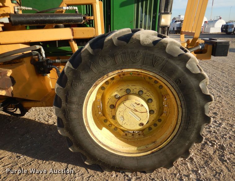 image for item KJ9159 2000 John Deere 7210  MFWD tractor