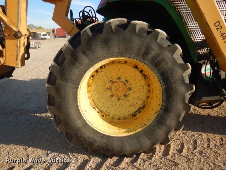 image for item KJ9159 2000 John Deere 7210  MFWD tractor