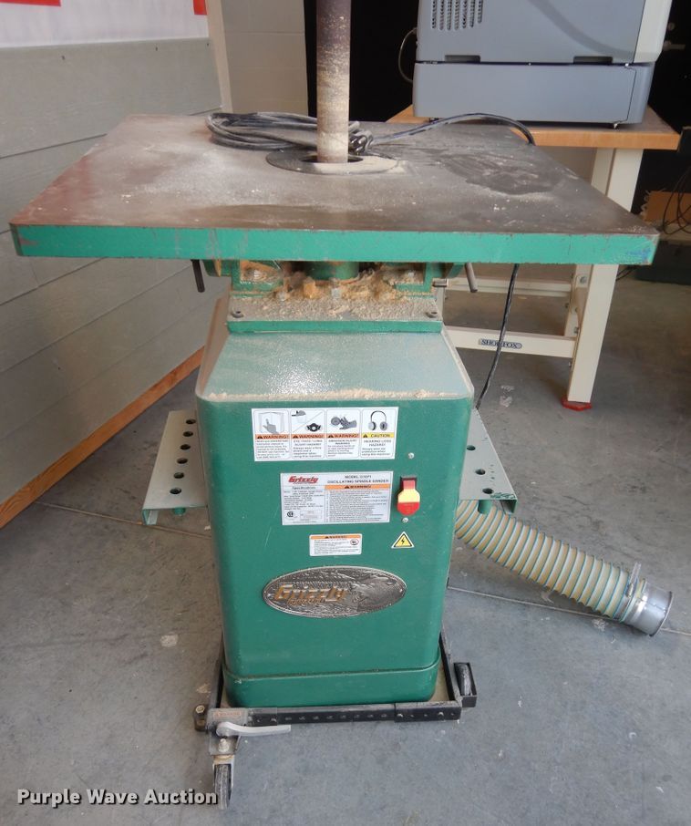2012 Grizzly G1071 oscillating spindle sander in Gardner, KS Item LG9799 sold Purple Wave