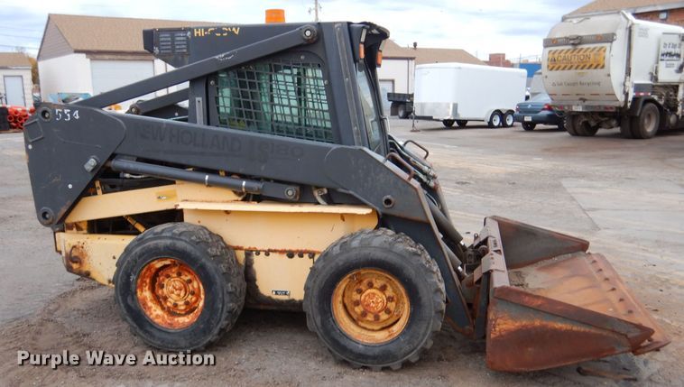 image for item LU9731 New Holland LS180  skid steer loader
