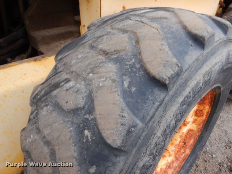 image for item LU9731 New Holland LS180  skid steer loader