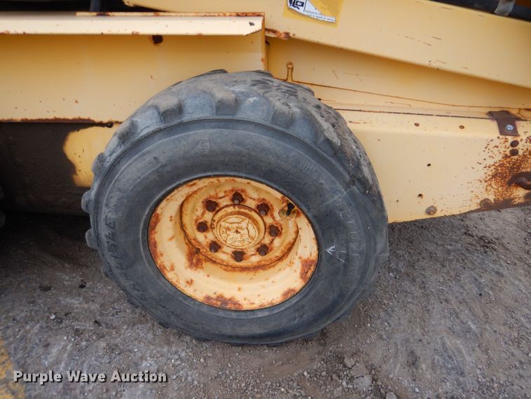 image for item LU9731 New Holland LS180  skid steer loader