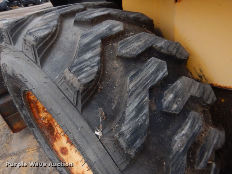 image for item LU9731 New Holland LS180  skid steer loader