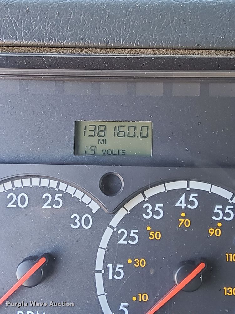 image for item DS1503 2002 Freightliner Business Class FL60  flatbed truck