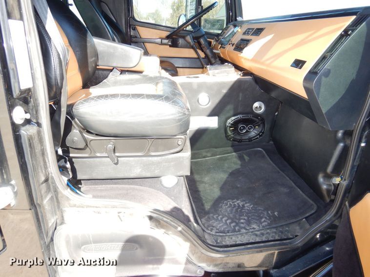 image for item DS1503 2002 Freightliner Business Class FL60  flatbed truck