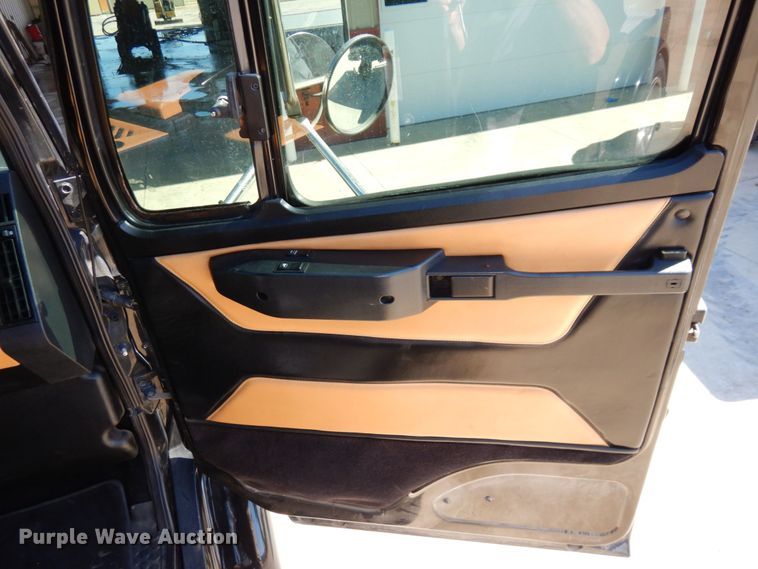 image for item DS1503 2002 Freightliner Business Class FL60  flatbed truck