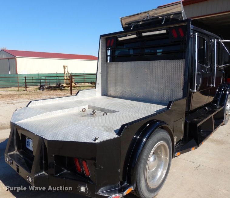 image for item DS1503 2002 Freightliner Business Class FL60  flatbed truck