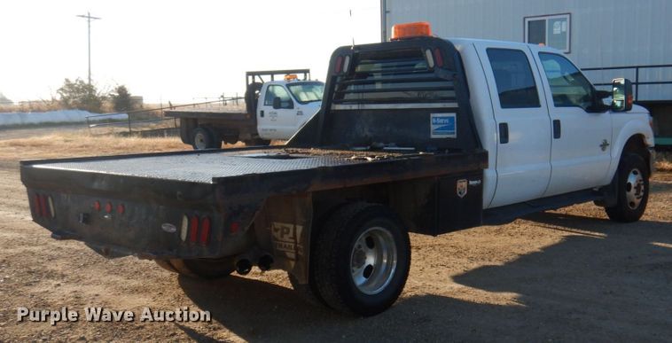 image for item MW9326 2013 Ford F350 Super Duty XLT  Crew Cab flatbed pickup truck