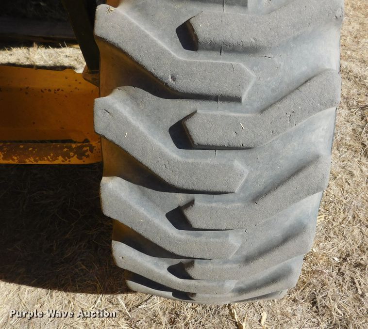 image for item DM2527 2013 John Deere 310K  backhoe