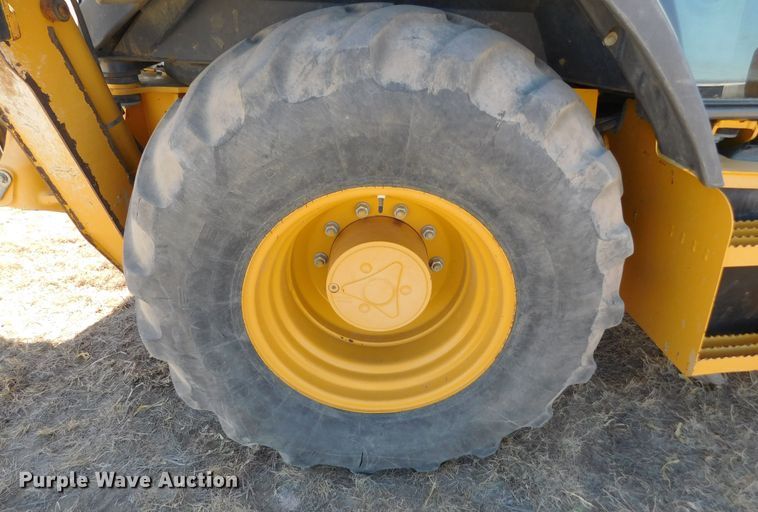 image for item DM2527 2013 John Deere 310K  backhoe