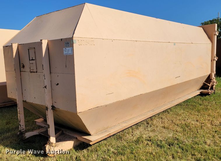 image for item DM8043 Wastequip  roll-off trash compactor dumpster