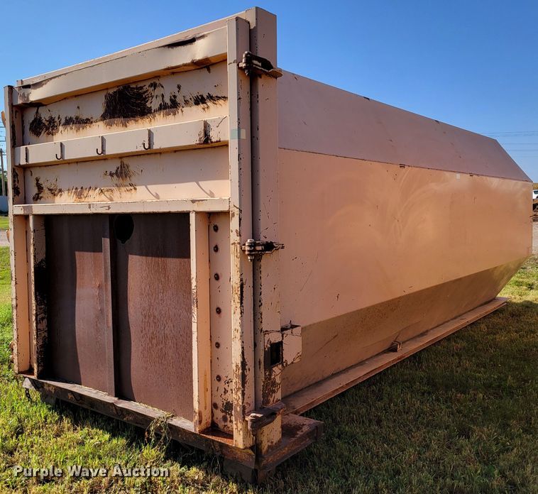 image for item DM8043 Wastequip  roll-off trash compactor dumpster