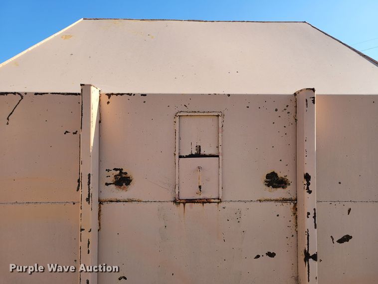 image for item DM8043 Wastequip  roll-off trash compactor dumpster