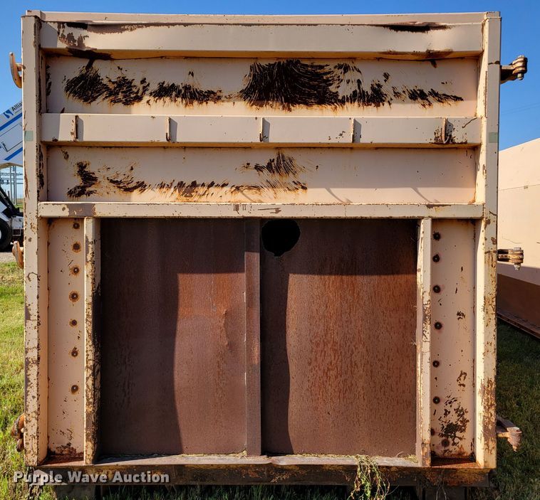 image for item DM8043 Wastequip  roll-off trash compactor dumpster
