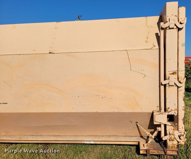 image for item DM8043 Wastequip  roll-off trash compactor dumpster