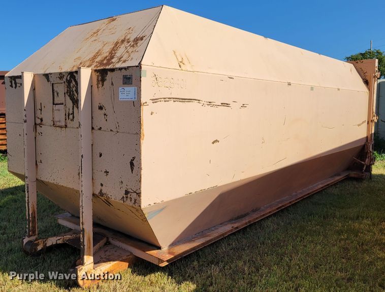 image for item DM8044 Wastequip  roll-off trash compactor dumpster
